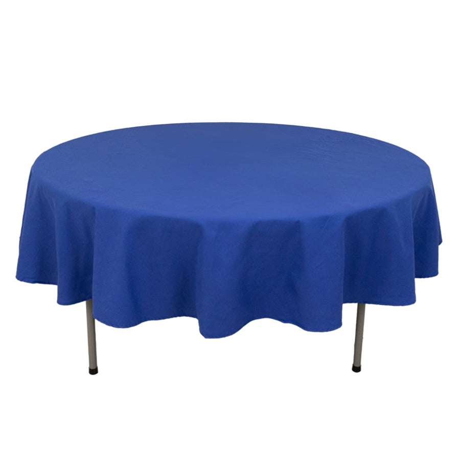 Blue round tablecloth on a table with a smooth finish.