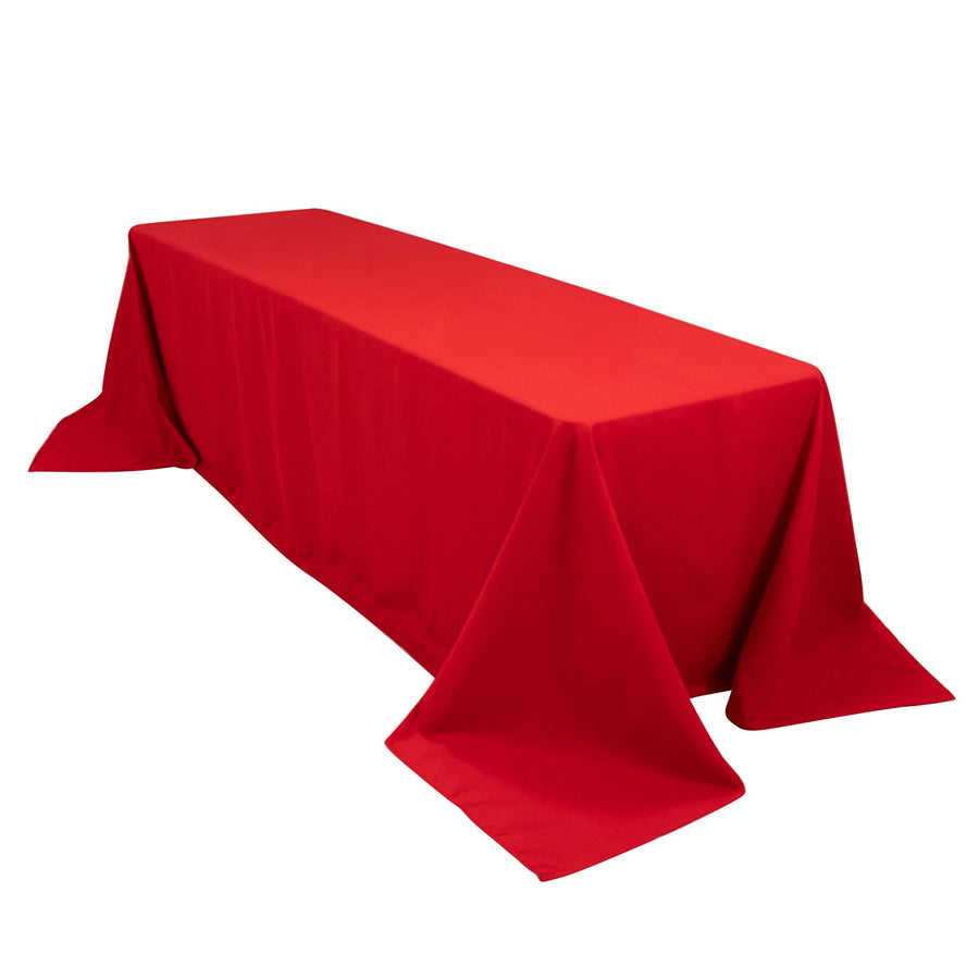 Red tablecloth draped elegantly over a long table.