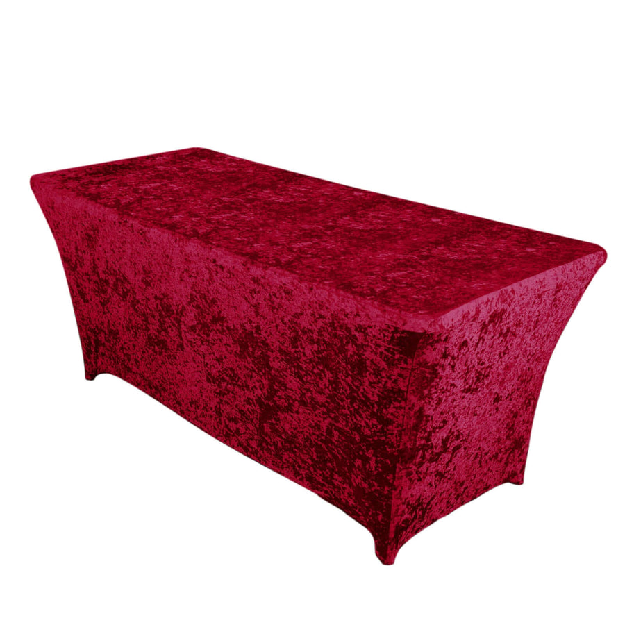 Red velvet table cover on a plain backdrop.