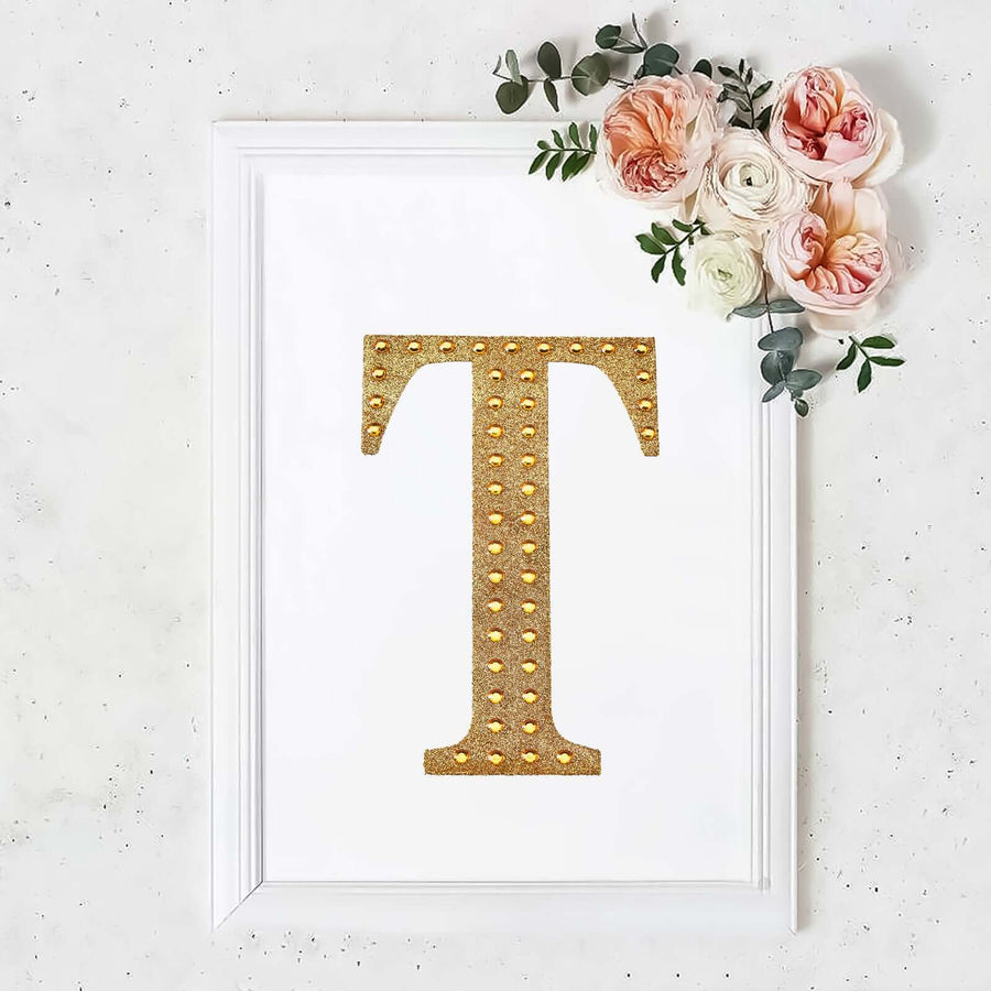 Framed gold studded letter "T" art print with floral accents
