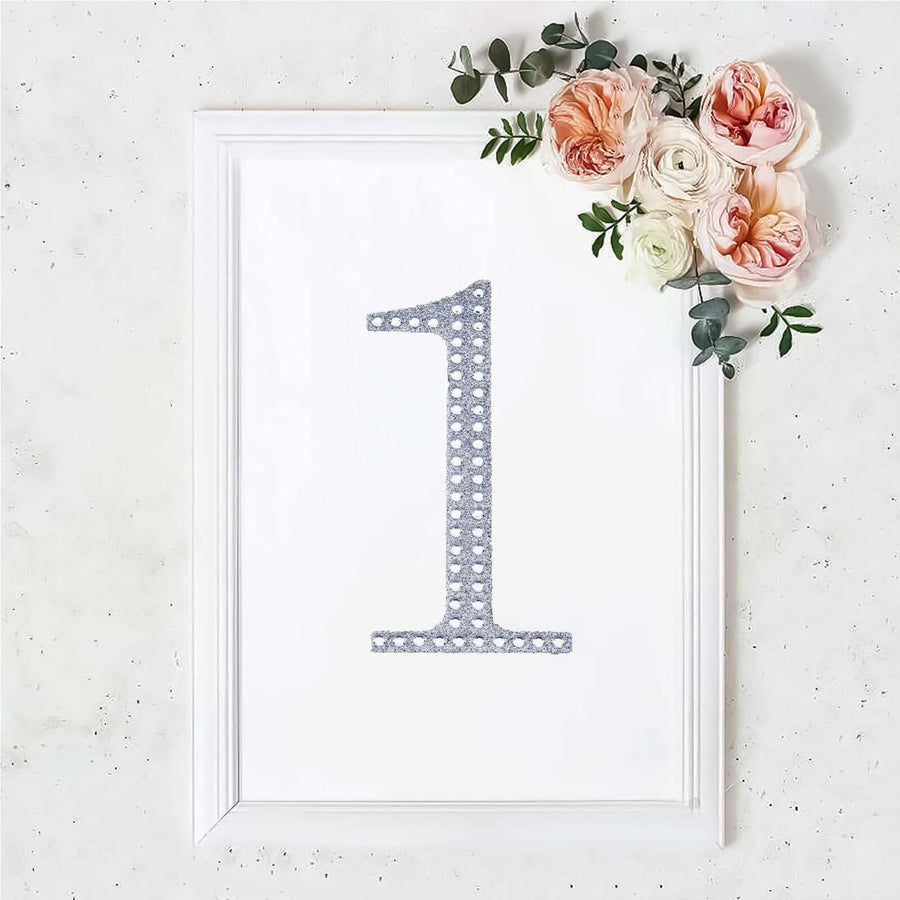 Framed decorative number "1" with flowers on a white background.