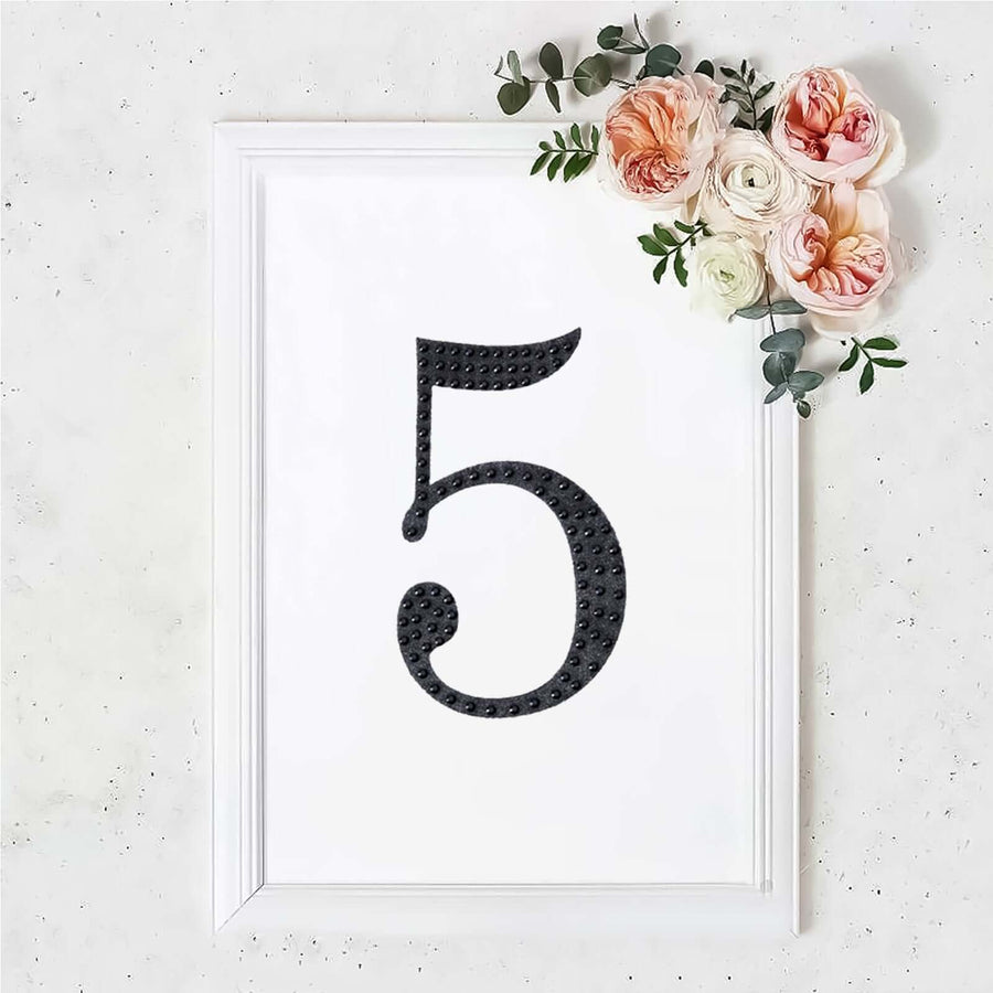 Decorative floral frame with the number 5 in a stylish design.