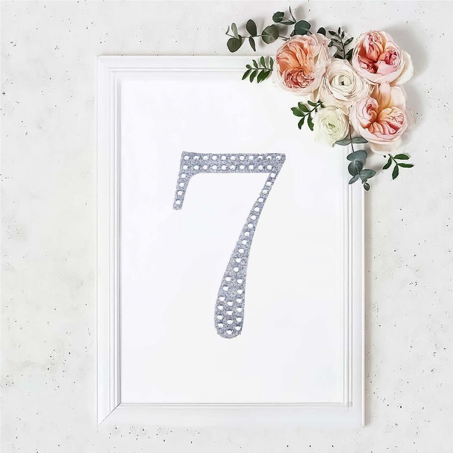 Decorative wall art featuring the number 7 surrounded by flowers