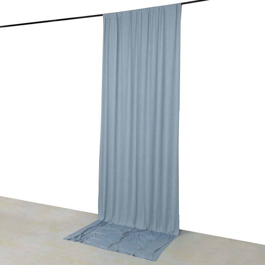 Light blue fabric backdrop hanging vertically