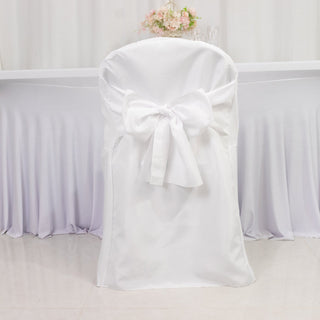 White chair cover with decorative bow, ideal for event decor.