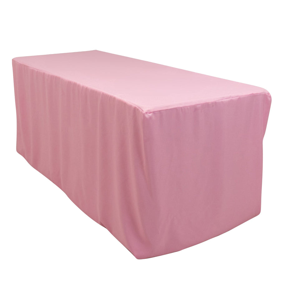 Pink table cover draped over a rectangular table