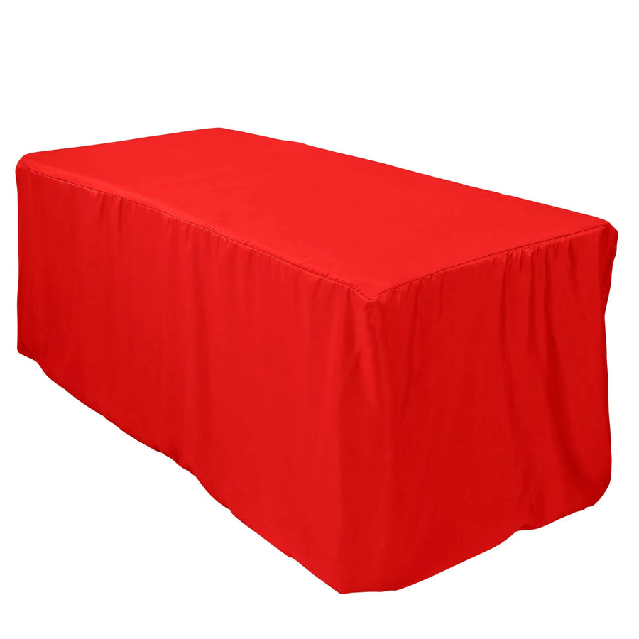 Red table cover draping over a rectangular table.