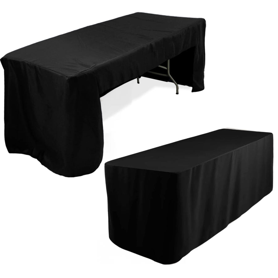 Black tablecloth for events and parties, draped over various table sizes.
