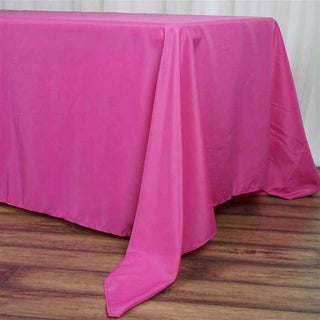 Add a Touch of Elegance to Your Event with the Fuchsia Polyester Rectangle Tablecloth