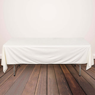 Elevate Your Table Setting with the Ivory Premium Scuba Wrinkle Free Rectangular Tablecloth Elevate Your Table Setting with the Ivory Premium Scuba Wrinkle Free Rectangular Tablecloth