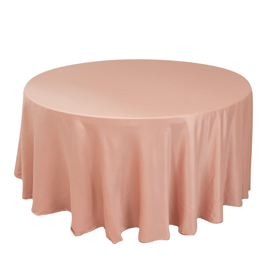 Round pink tablecloth on a white background.