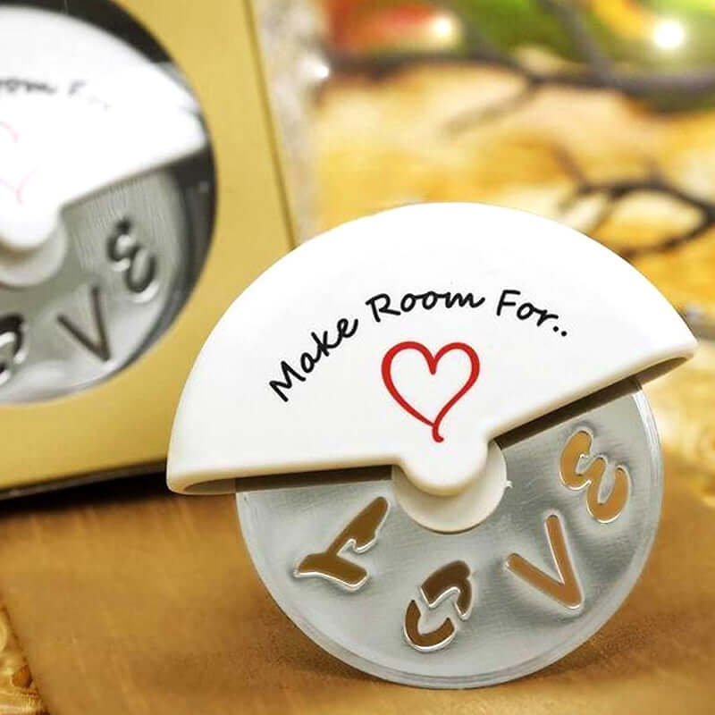 Love-themed pizza cutter with a heart design and "Make Room For.." text.