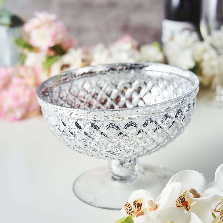 Silver glass compote bowl with intricate diamond pattern and reflective finish.