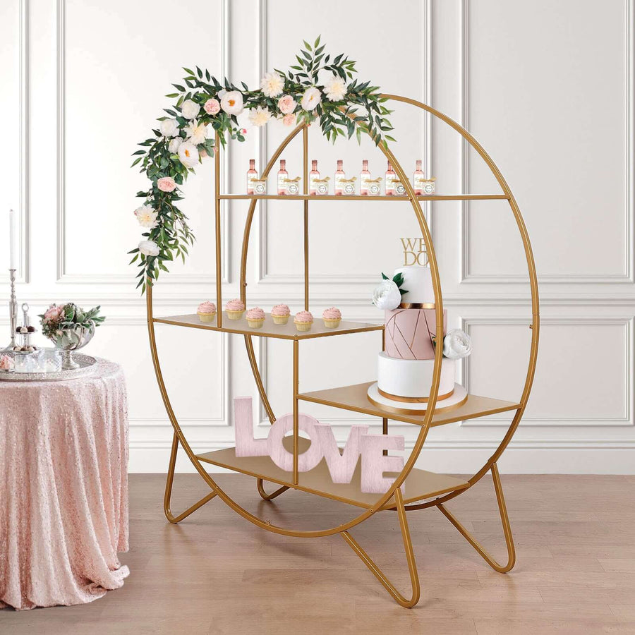 Elegant gold display shelf with floral decor, cupcakes, and "LOVE" sign.