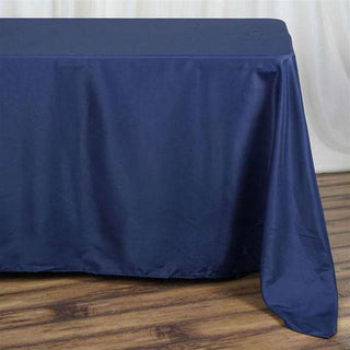 Unleash the Elegance with the Navy Blue 90"x132" Seamless Polyester Rectangular Tablecloth Unleash the Elegance with the Navy Blue 90"x132" Seamless Polyester Rectangular Tablecloth