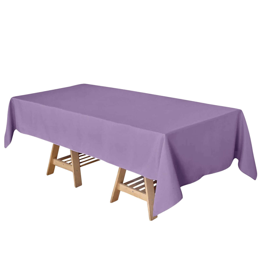 Purple tablecloth draped over a wooden table