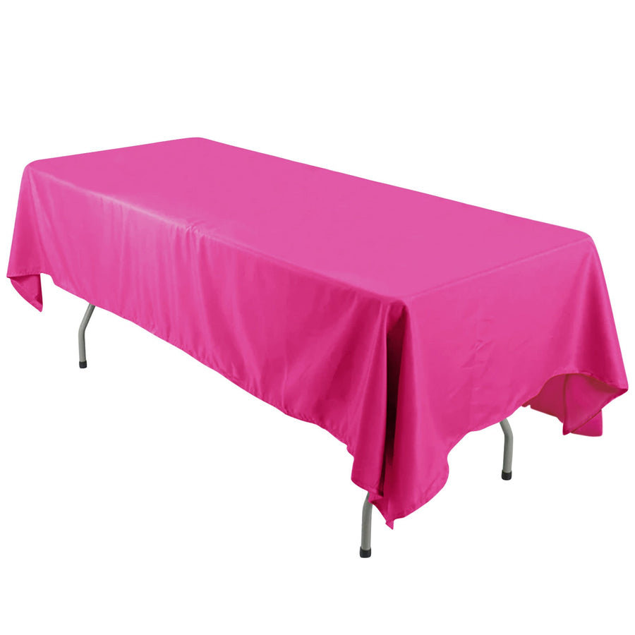 Pink tablecloth draped over a rectangular table