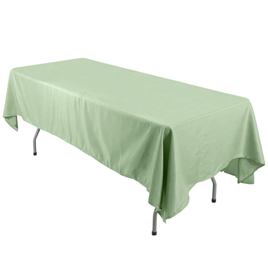 Green tablecloth draped over a folding table