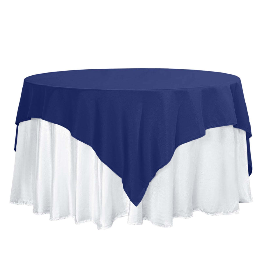 Round table with navy blue and white tablecloth