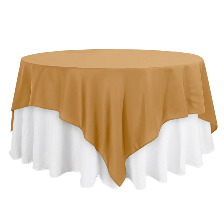 Round table with a gold and white tablecloth