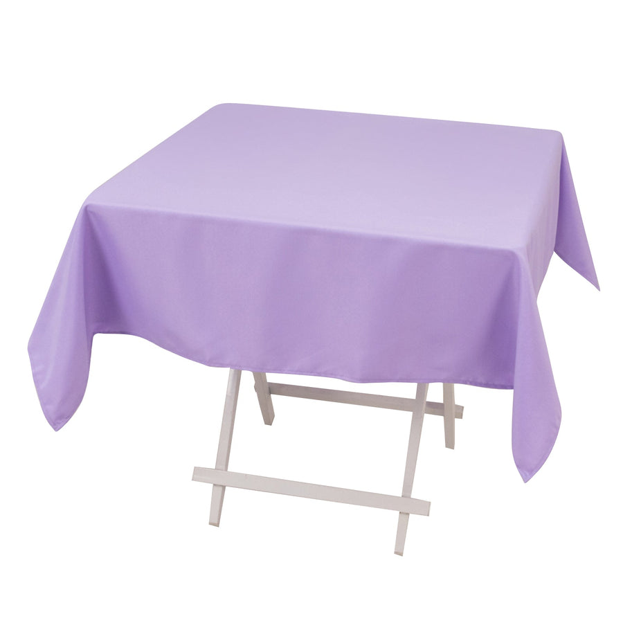 Purple tablecloth draped over a folding table