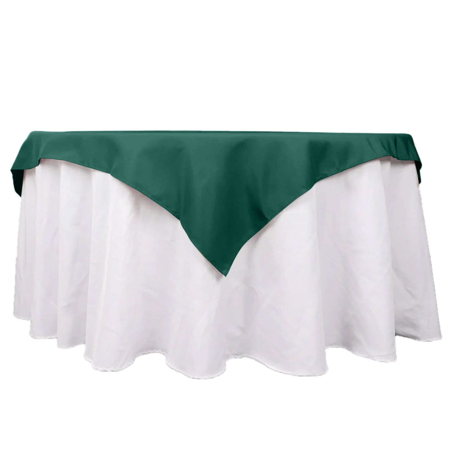 Green and white tablecloth set for elegant dining occasions