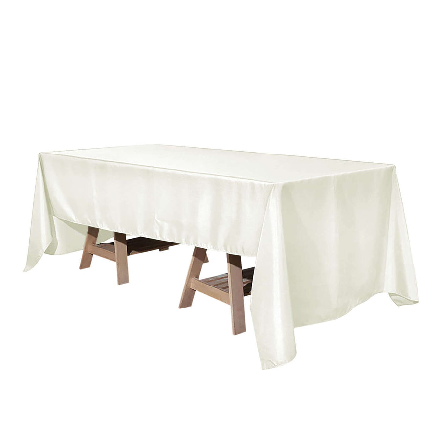 White tablecloth draped over a wooden table