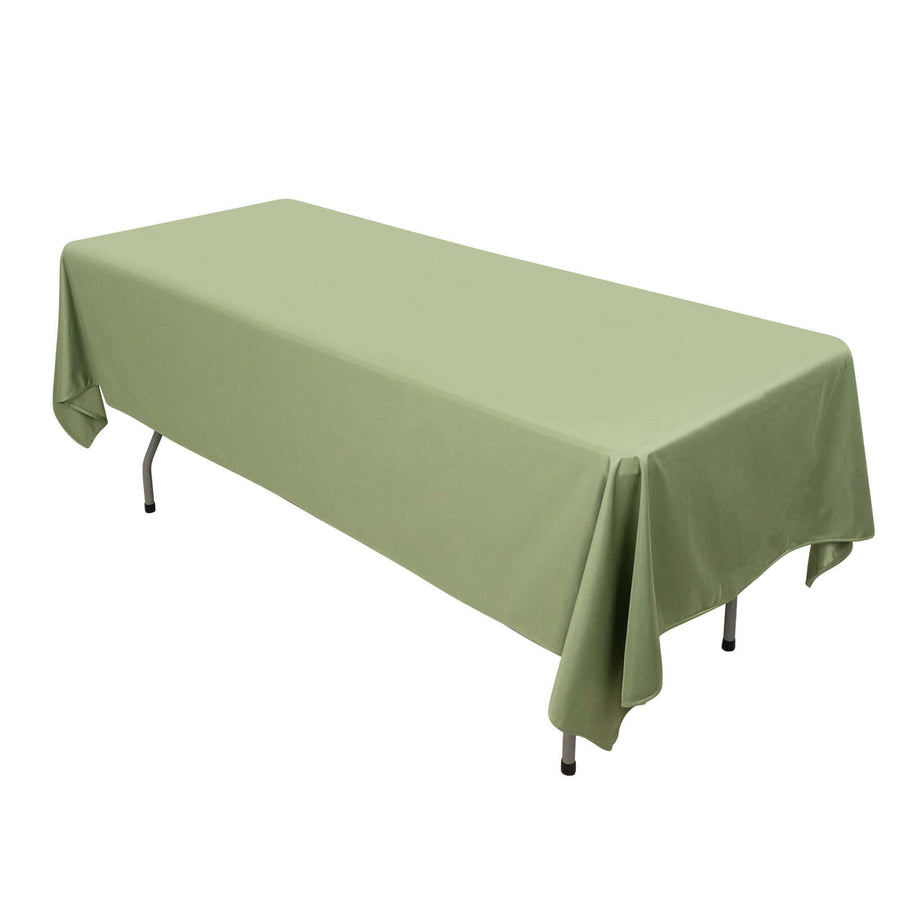 Green tablecloth draped over a folding table