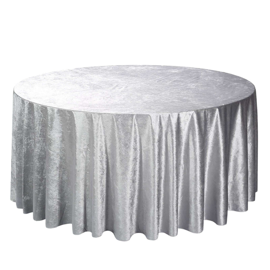 Silver round tablecloth with a textured finish.