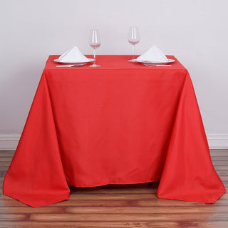 Create a Stunning Red Event Decor with a Seamless Square Polyester Table Overlay