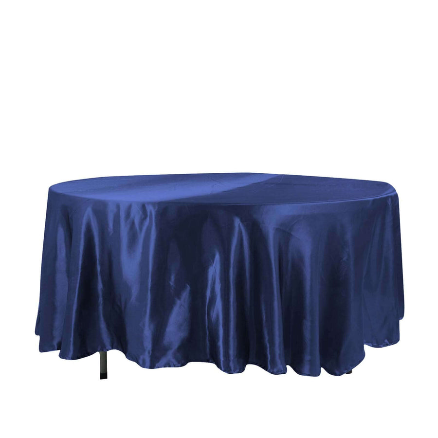 Navy blue round tablecloth on a table