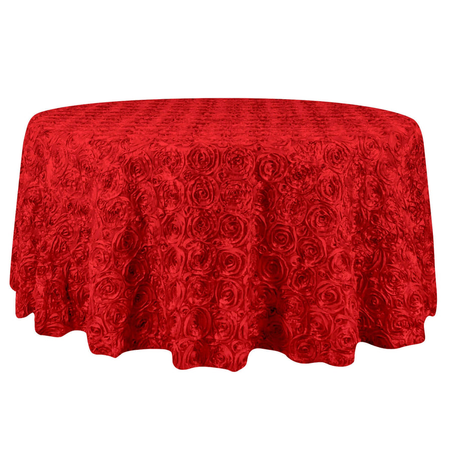 Red rose-patterned tablecloth on a round table.