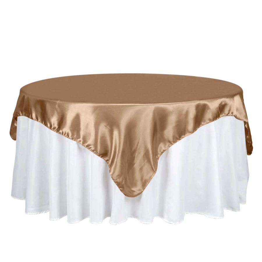 Brown satin tablecloth on a white ruffled table cover