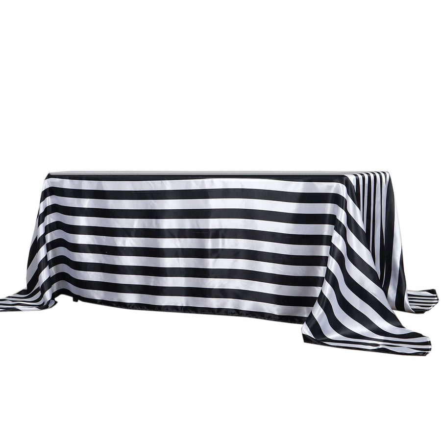 Black and white striped tablecloth draped on a table