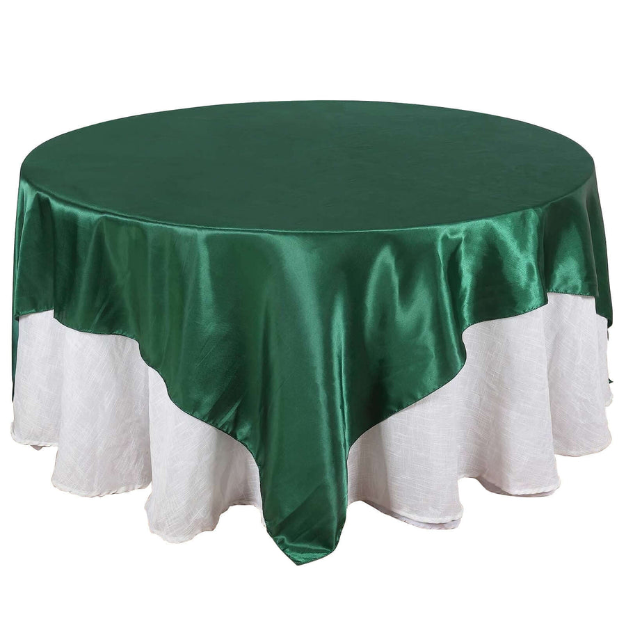 Green satin round tablecloth with white lace trim