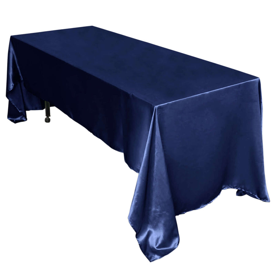Navy blue satin tablecloth on a white background