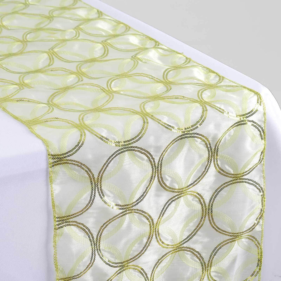 Decorative green and gold table runner with circular patterns
