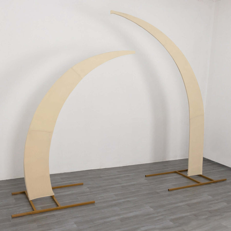 Curved fabric display stands in a studio setting
