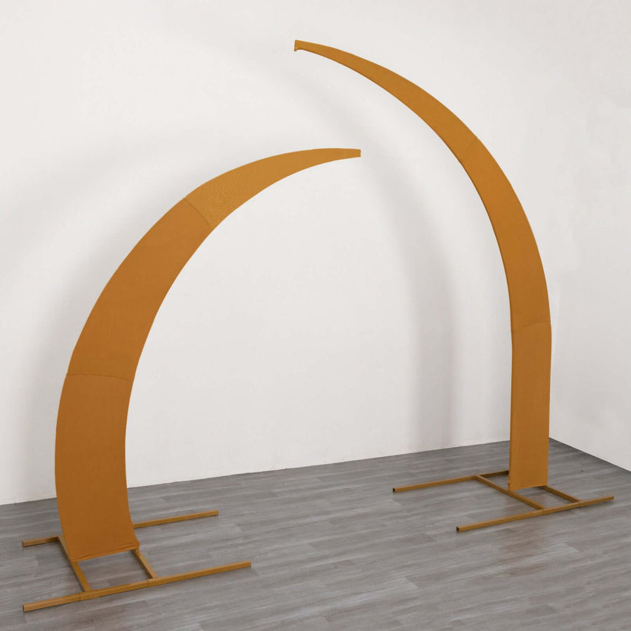 Orange curved display stands on a gray floor against a white wall.