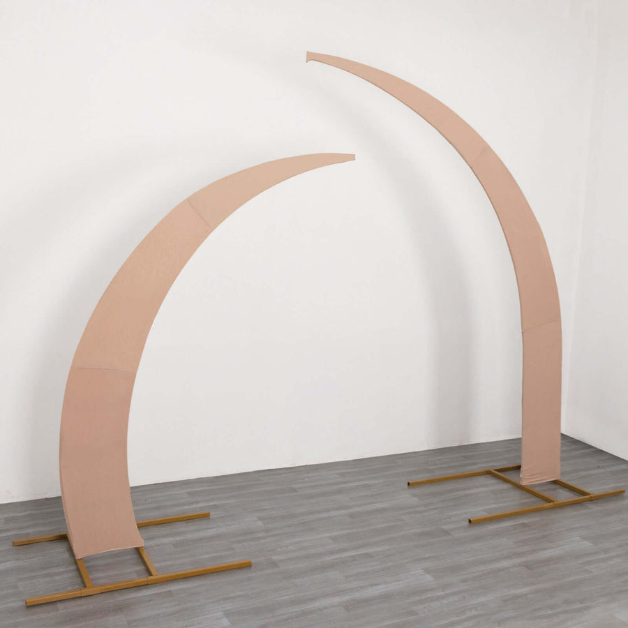 Curved display stands in beige with gold bases on a white background
