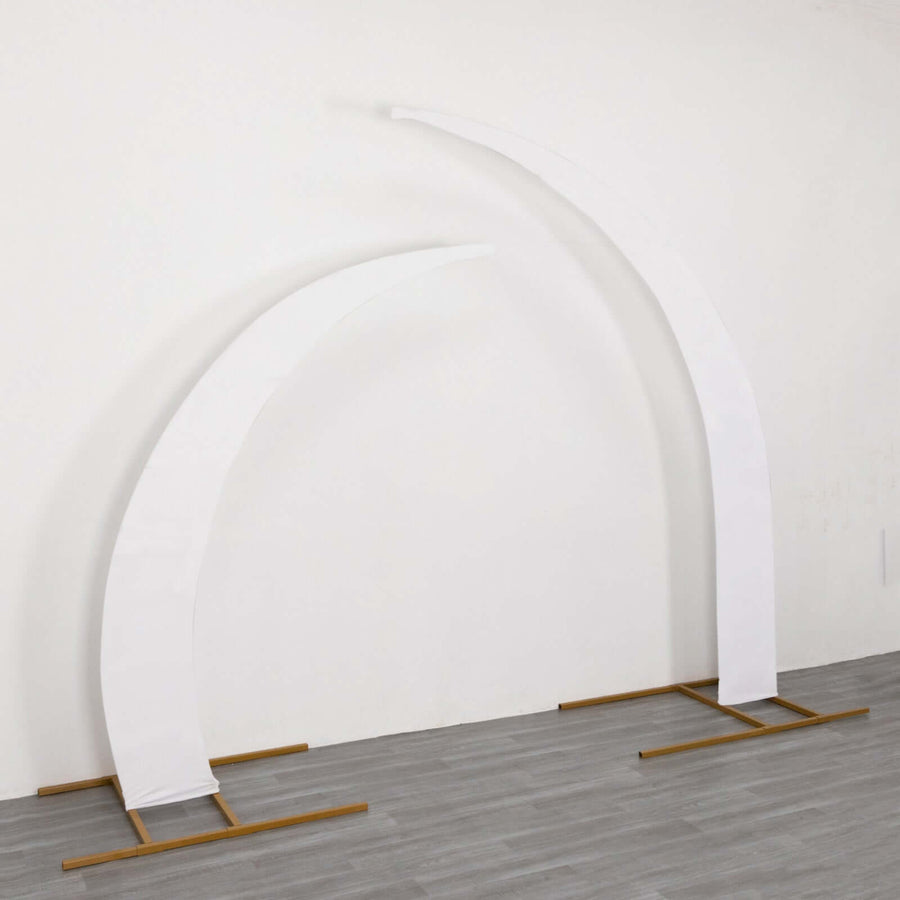 White curved display stands on a wooden base against a plain background.