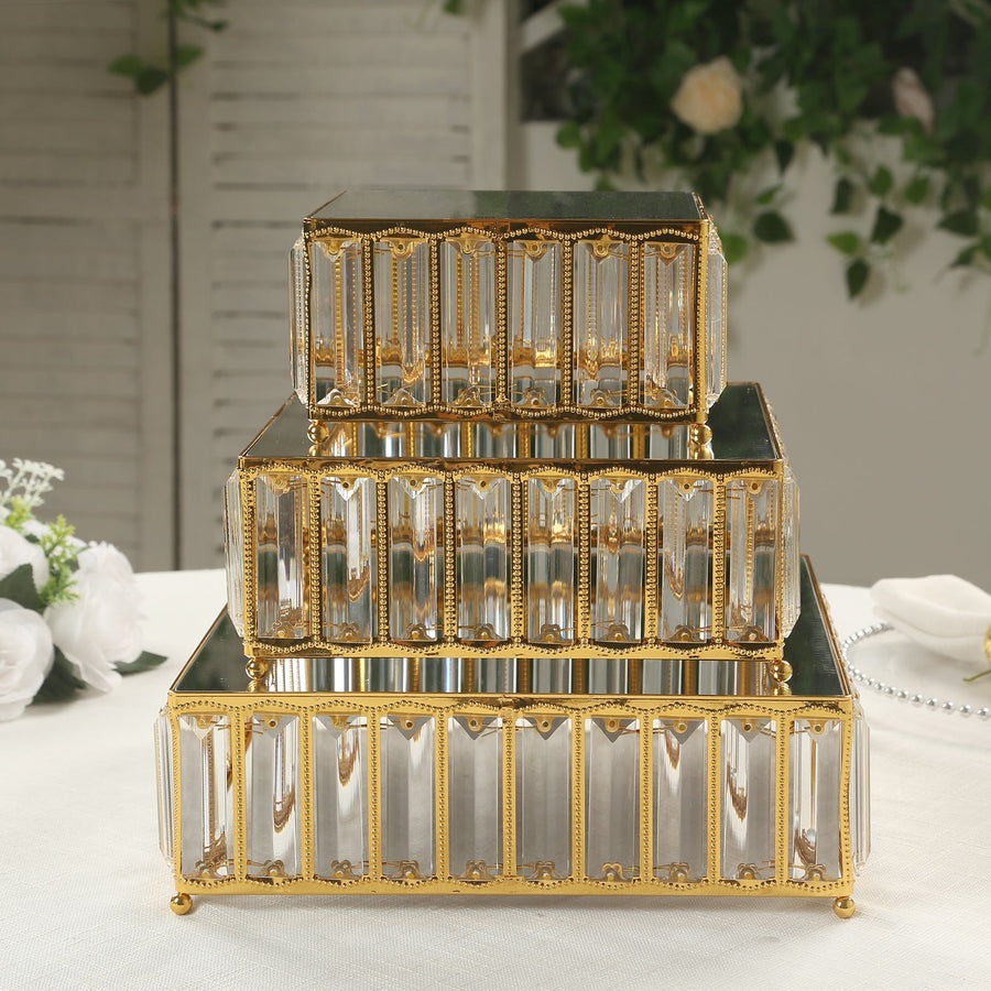 Tiered mirrored display boxes with gold accents