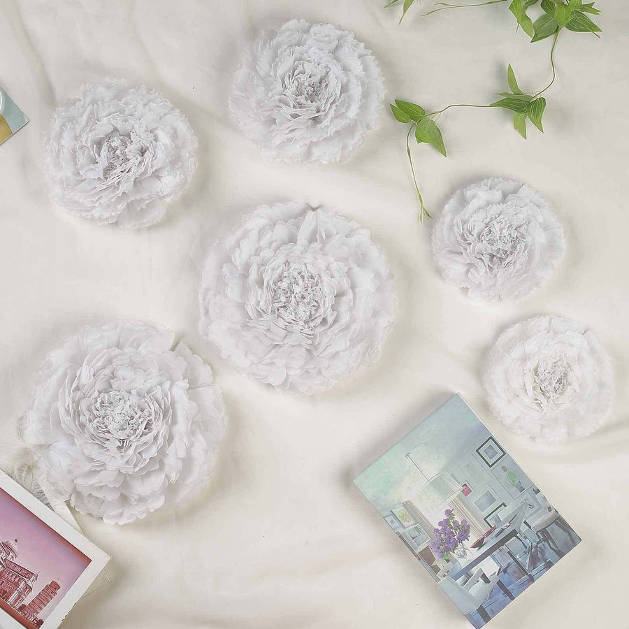 White floral decorations arranged artistically on a soft background.