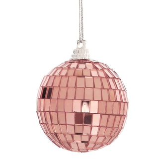 Pink disco ball ornament hanging on a silver string. #whtbkgd