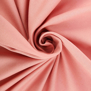 Pink textured fabric in a spiral arrangement.