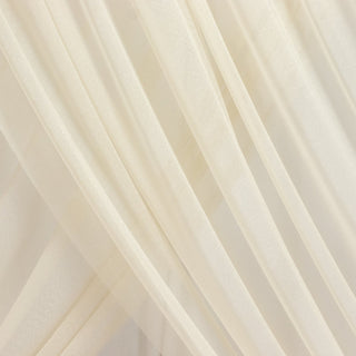 Soft ivory sheer fabric drapes elegantly in gentle folds. #whtbkgd