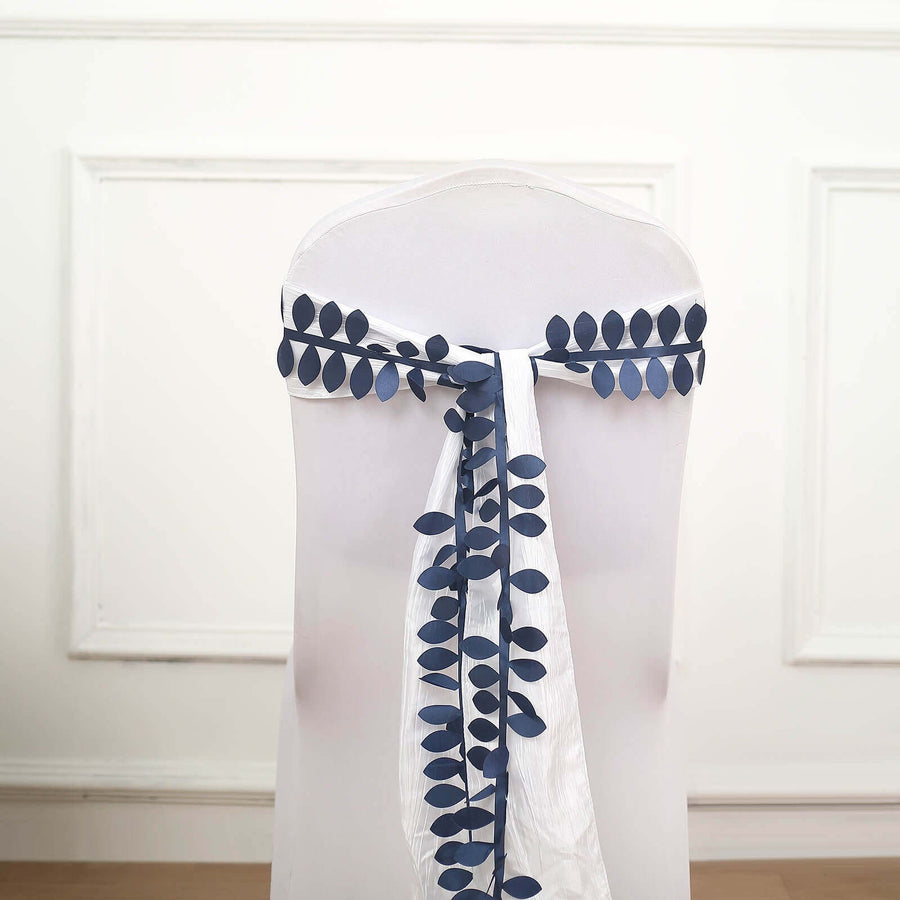 Navy leaf design chair sash on a white chair