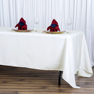 <strong>Ivory Premium Polyester Rectangle Tablecloth</strong> <strong>Ivory Premium Polyester Rectangle Tablecloth</strong>