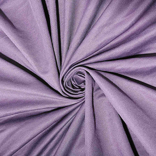 Purple textured fabric in a spiral layout.