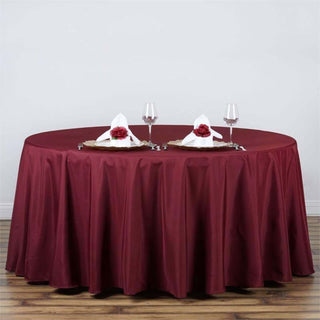 Elevate Your Event with the Burgundy Seamless Polyester Round Tablecloth Elevate Your Event with the Burgundy Seamless Polyester Round Tablecloth